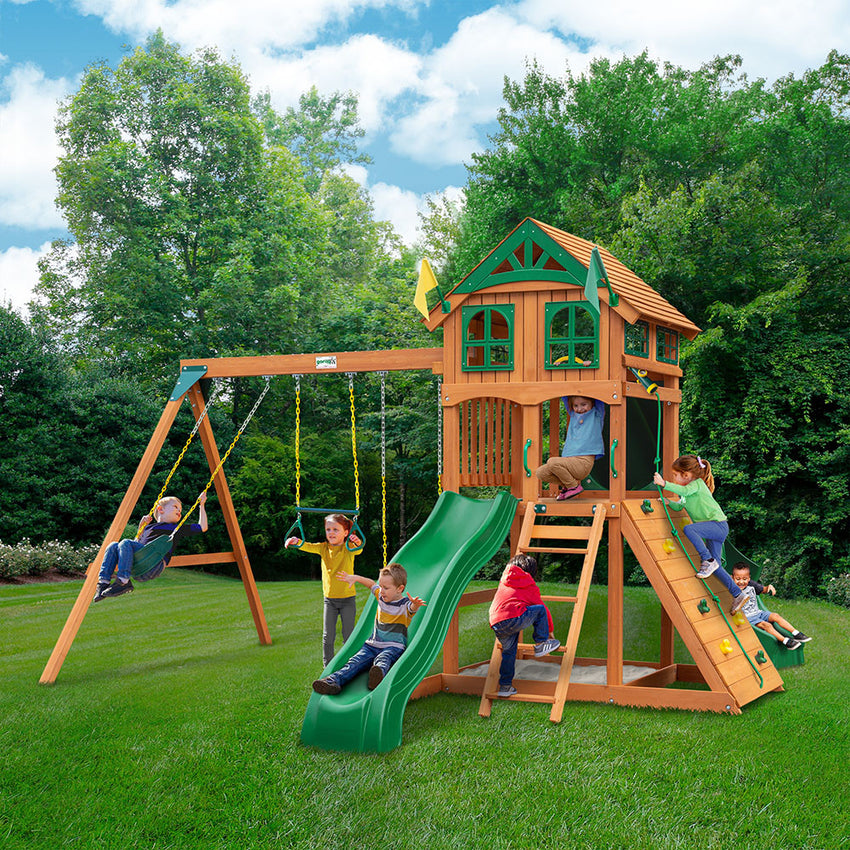 Kids playing on the Outing Series swing set